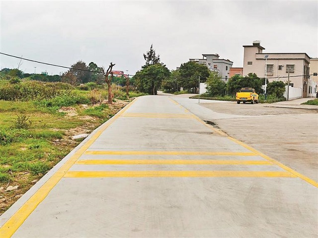 整治后道路平整宽敞。.jpg